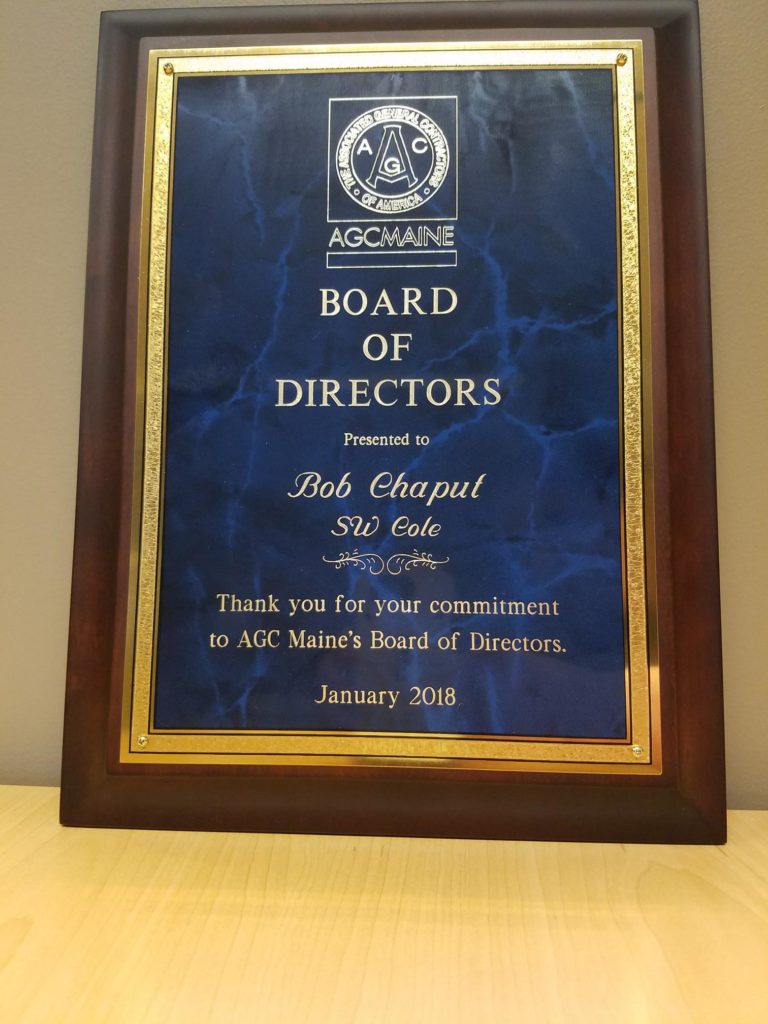 award plaque that reads AGCMaine Board of Directors presented to Bob Chaput SW Cole Thank you for your commitment to AGC Maine's Board of Directors January 2018