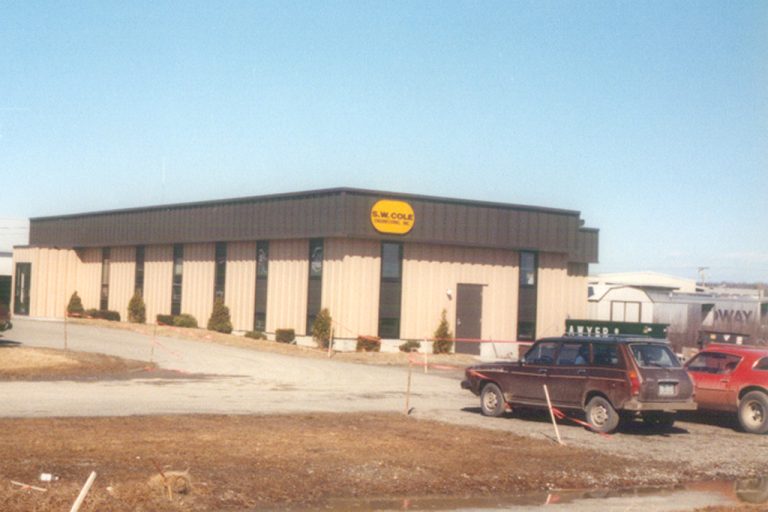 Historical photo of the headquarters of S. W. Cole Engineering in Hermon, Maine.