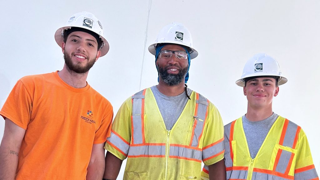 Three S.W. Cole team members at a job site.