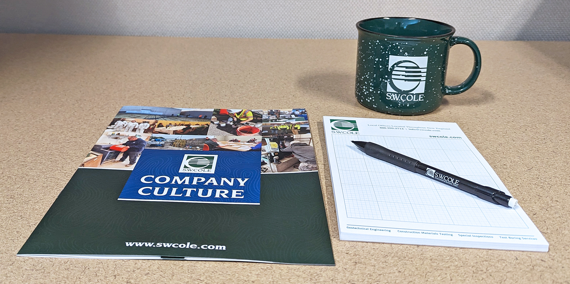 S. W. Cole mechanical pencil, graph paper notepad, mug and company culture document