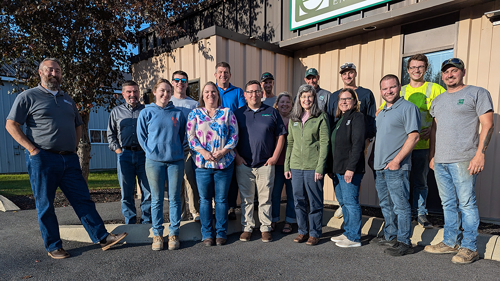 Group photo of S. W. Cole team members at a 45th anniversary event.