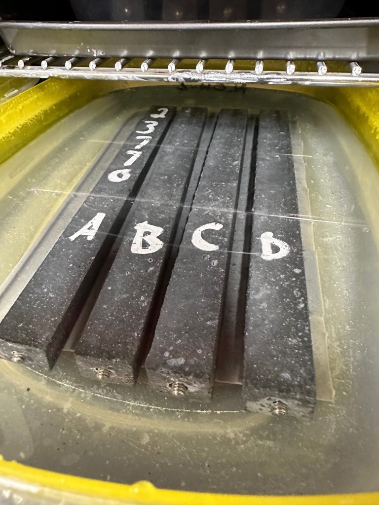 ASR testing samples in a heated solution of sodium hydroxide.