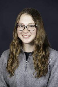 Professional headshot photo of Alex Allen