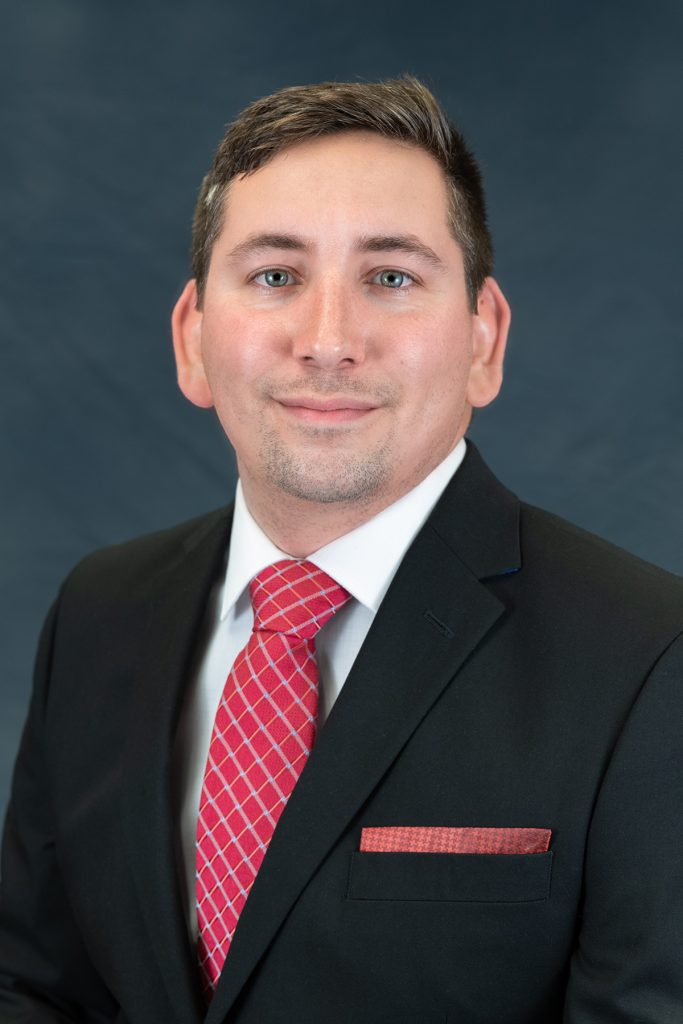 Professional headshot photo of Sean Giroux