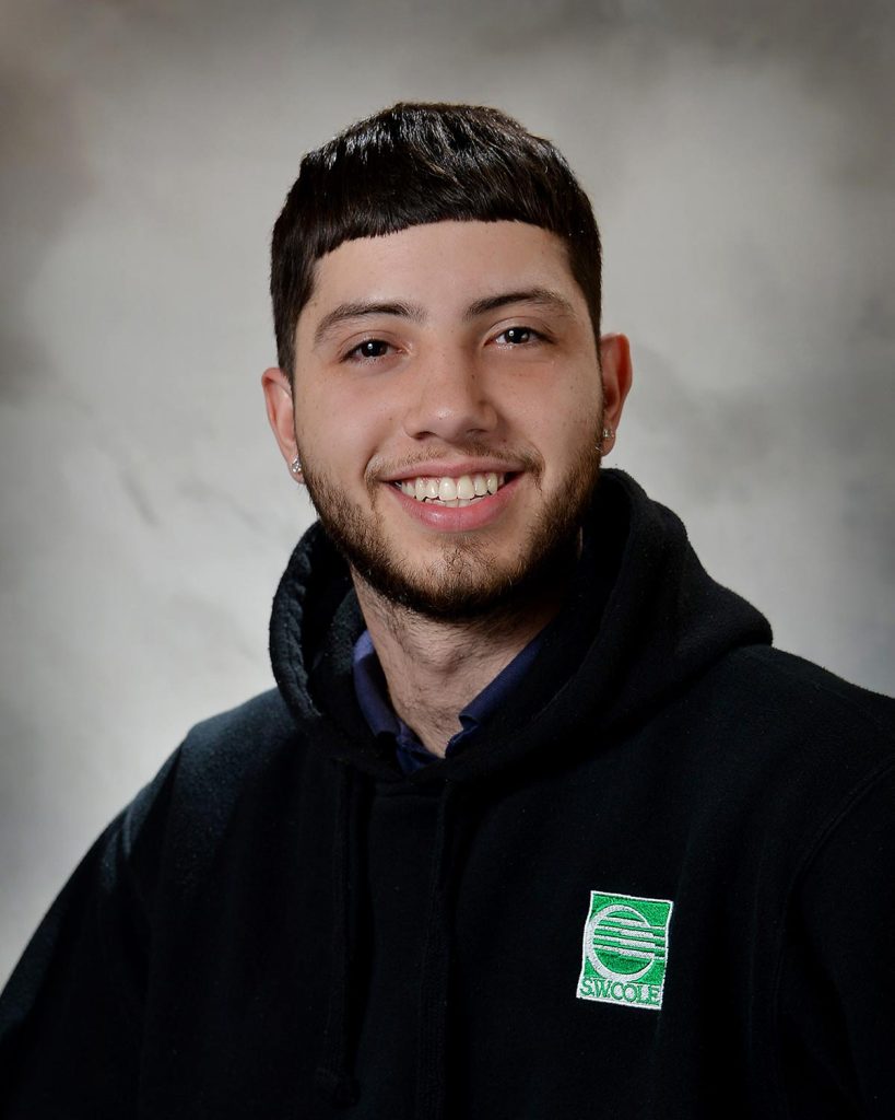 Professional headshot photo of Ethan Medeiros