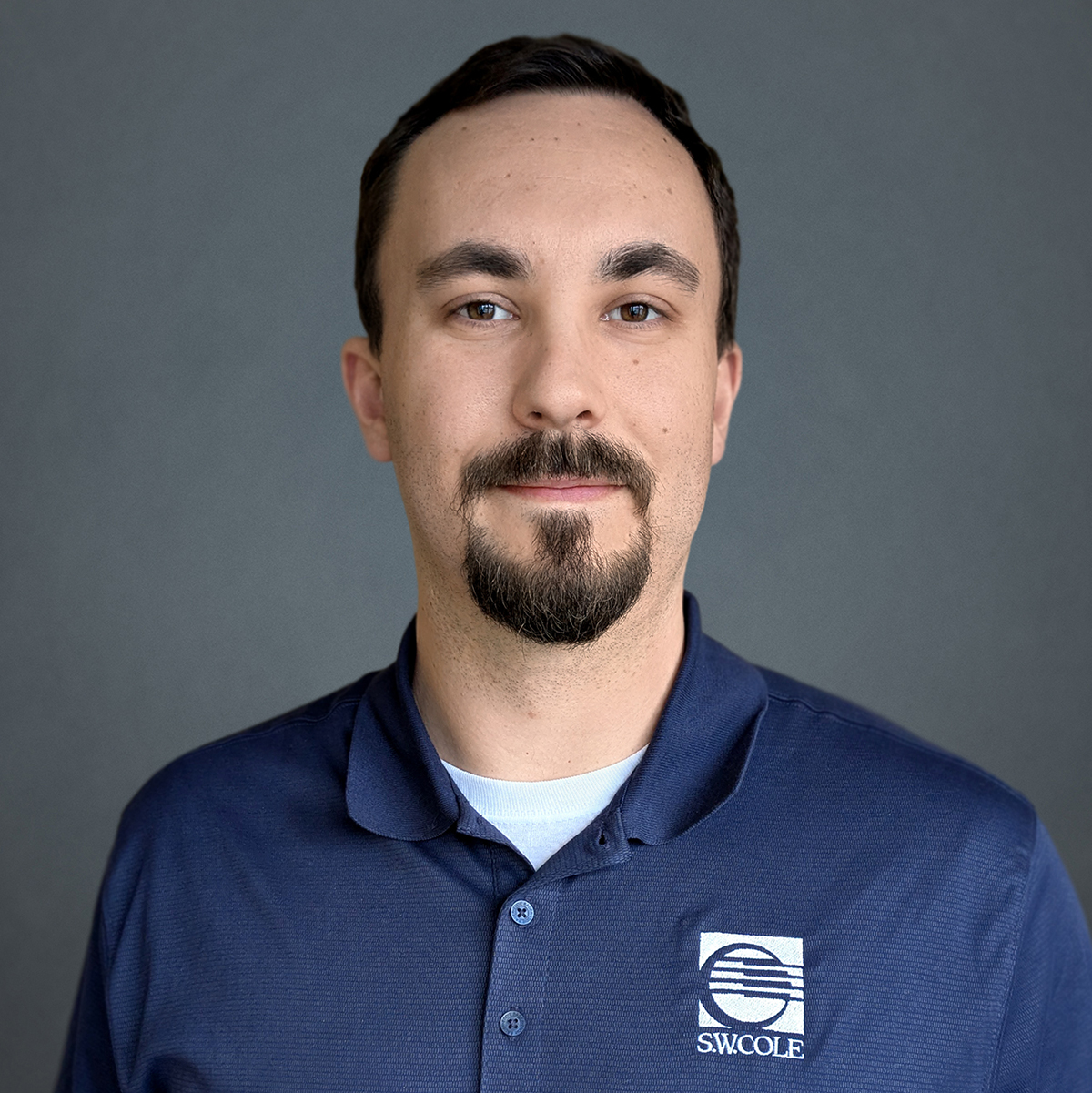 Professional headshot photo of Huston McCollum