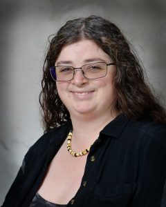 Professional headshot photo of Jordan Paine