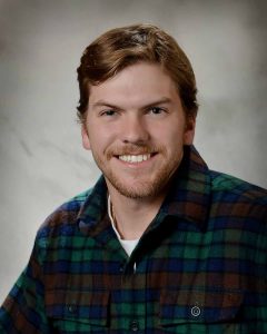 Professional headshot photo of Sean Hlywa